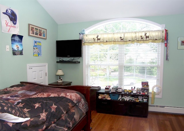 8 Mannes St, Ronkonkoma, NY 11779 - bedroom with lofted ceiling, a baseboard heating unit, wood finished floors, and multiple windows