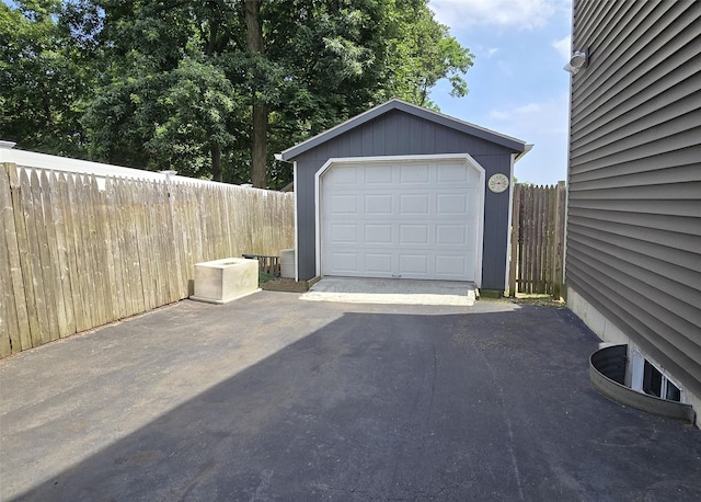 8 Mannes St, Ronkonkoma, NY 11779 - garage featuring driveway