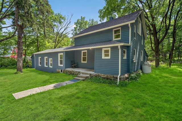 123 Newport Bridge Rd, Warwick, NY 10990 - view of front of home with a front yard, a shingled roof, and a chimney