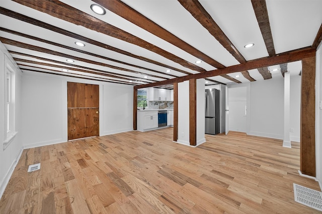 123 Newport Bridge Rd, Warwick, NY 10990 - unfurnished living room featuring recessed lighting, beam ceiling, and light wood-type flooring