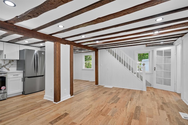 123 Newport Bridge Rd, Warwick, NY 10990 - unfurnished living room with stairway, light wood-type flooring, healthy amount of natural light, beam ceiling, and recessed lighting