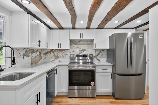 123 Newport Bridge Rd, Warwick, NY 10990 - kitchen featuring appliances with stainless steel finishes, white cabinets, beamed ceiling, recessed lighting, and light stone countertops