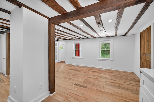 123 Newport Bridge Rd, Warwick, NY 10990 - empty room with recessed lighting, light wood-style flooring, and beam ceiling