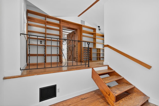 123 Newport Bridge Rd, Warwick, NY 10990 - staircase featuring lofted ceiling and wood finished floors