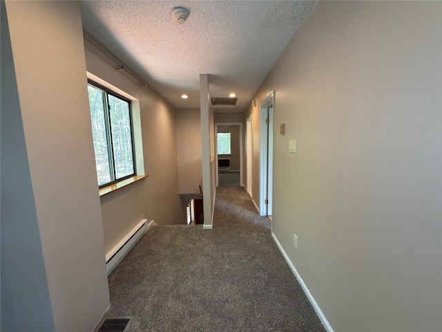 59 Meadowlark Ln, Woodridge, NY 12789 - hallway featuring a baseboard radiator, a textured ceiling, carpet floors, and recessed lighting