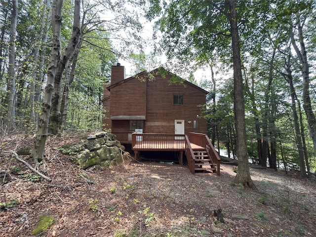 59 Meadowlark Ln, Woodridge, NY 12789 - rear view of property with a deck and a chimney