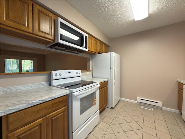 59 Meadowlark Ln, Woodridge, NY 12789 - kitchen featuring white appliances, a baseboard radiator, brown cabinetry, light countertops, and a textured ceiling