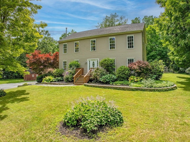 27 Balsam Rd, Hyde Park, NY 12538 - colonial home featuring a front lawn