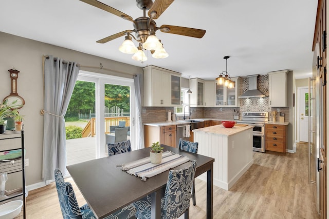 27 Balsam Rd, Hyde Park, NY 12538 - dining room featuring light wood-style floors and a ceiling fan