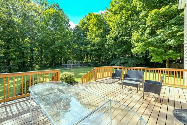 27 Balsam Rd, Hyde Park, NY 12538 - wooden terrace with a fenced backyard, outdoor dining space, view of wooded area, and outdoor lounge area