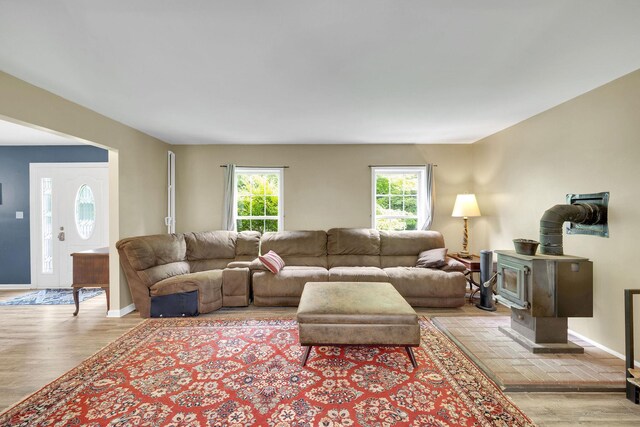 27 Balsam Rd, Hyde Park, NY 12538 - living area featuring a wood stove and light wood-type flooring