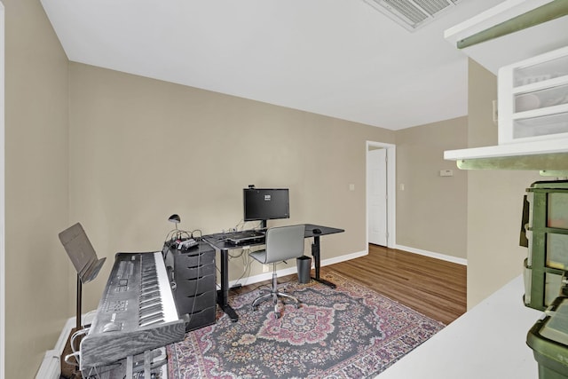 27 Balsam Rd, Hyde Park, NY 12538 - home office featuring wood finished floors and a baseboard radiator