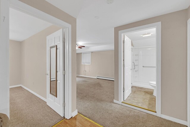 27 Balsam Rd, Hyde Park, NY 12538 - corridor featuring carpet floors and baseboard heating