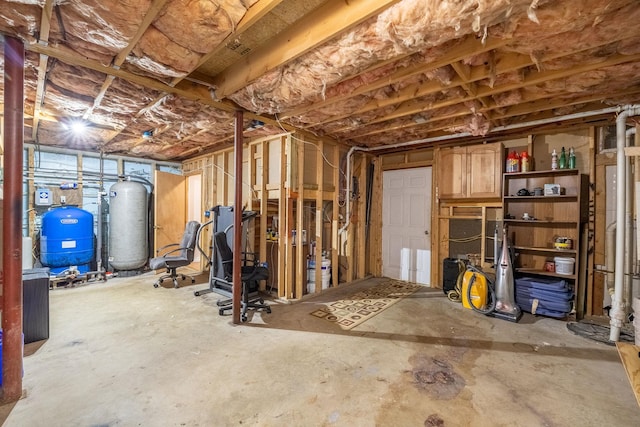 27 Balsam Rd, Hyde Park, NY 12538 - unfinished below grade area with a water pressure tank and a water softener