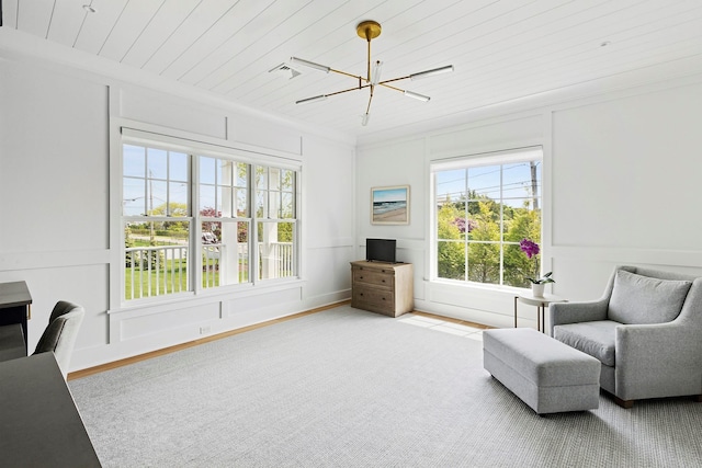 1 Fiske Ave, Westhampton Beach, NY 11978 - sitting room featuring a chandelier, wooden ceiling, plenty of natural light, and crown molding