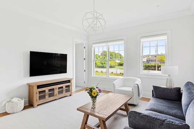 1 Fiske Ave, Westhampton Beach, NY 11978 - living area with crown molding, wood finished floors, and a chandelier
