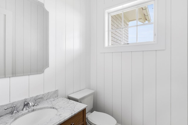 1 Fiske Ave, Westhampton Beach, NY 11978 - half bathroom featuring toilet and vanity