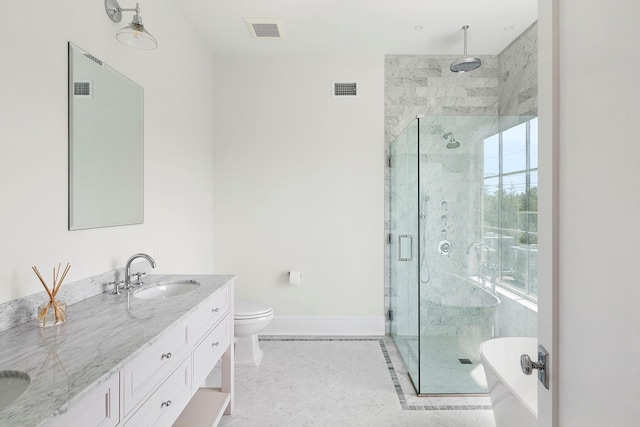1 Fiske Ave, Westhampton Beach, NY 11978 - bathroom featuring a stall shower, double vanity, and a freestanding tub