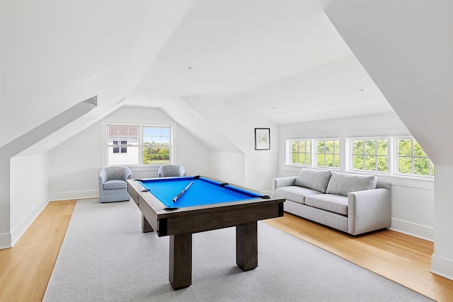 1 Fiske Ave, Westhampton Beach, NY 11978 - playroom featuring light wood-type flooring, vaulted ceiling, healthy amount of natural light, and pool table