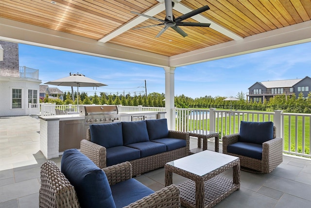 1 Fiske Ave, Westhampton Beach, NY 11978 - view of patio with an outdoor kitchen, an outdoor living space, and a ceiling fan