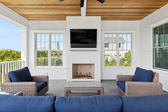 1 Fiske Ave, Westhampton Beach, NY 11978 - view of patio with an outdoor living space with a fireplace and ceiling fan