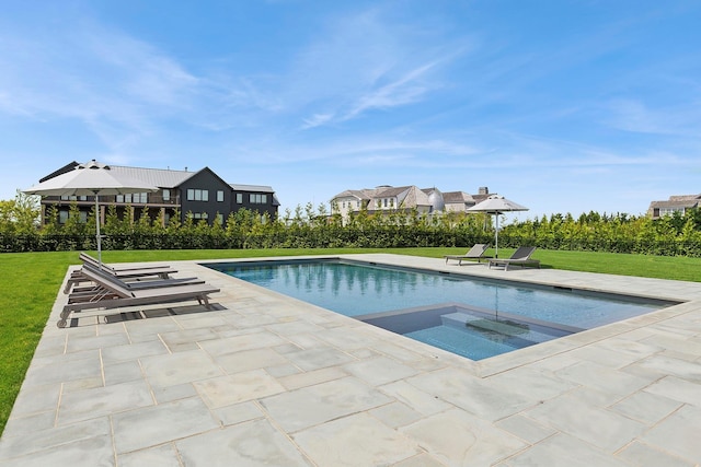 1 Fiske Ave, Westhampton Beach, NY 11978 - view of swimming pool with a patio area, a lawn, and a pool with connected hot tub