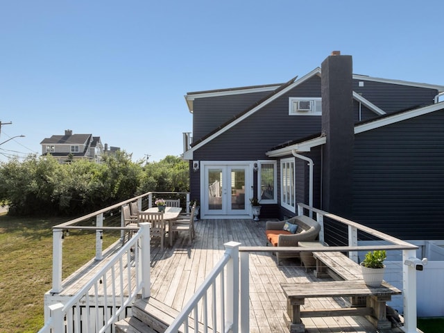 8 The Fairway, Oak Beach, NY 11702 - wooden terrace featuring french doors, outdoor dining area, and a yard