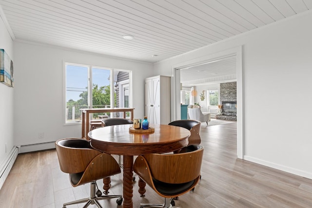 8 The Fairway, Oak Beach, NY 11702 - dining area with ornamental molding, healthy amount of natural light, wooden ceiling, and light wood-style flooring