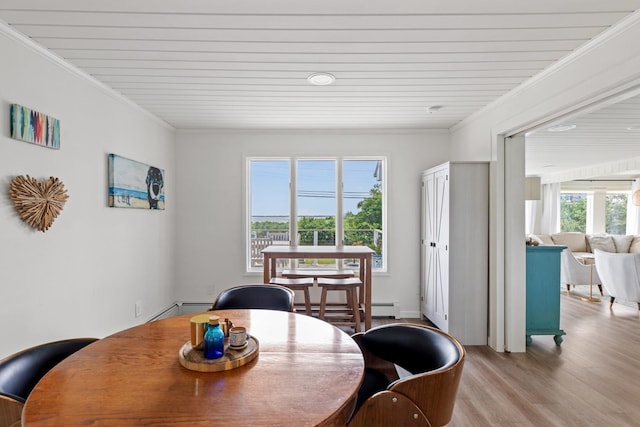 8 The Fairway, Oak Beach, NY 11702 - dining room featuring wood finished floors, crown molding, wooden ceiling, and a baseboard heating unit