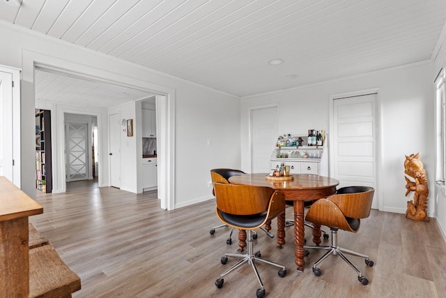 8 The Fairway, Oak Beach, NY 11702 - dining area with crown molding, light wood-type flooring, and wood ceiling