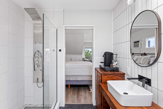 8 The Fairway, Oak Beach, NY 11702 - bathroom with connected bathroom, a shower stall, and a wall mounted AC