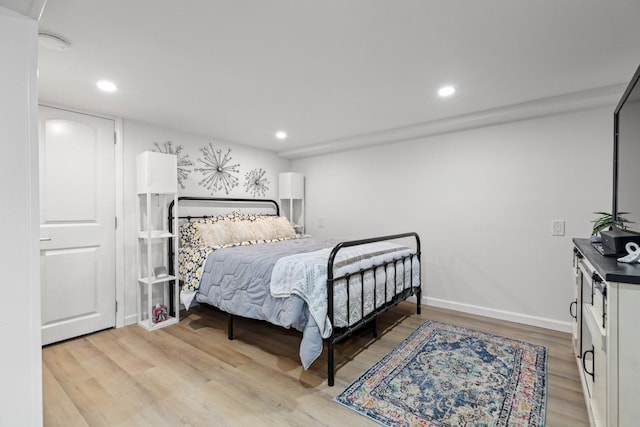 8 The Fairway, Oak Beach, NY 11702 - bedroom featuring light wood-type flooring and recessed lighting