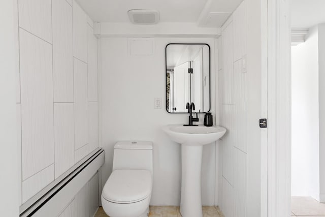 8 The Fairway, Oak Beach, NY 11702 - bathroom with a baseboard radiator and toilet