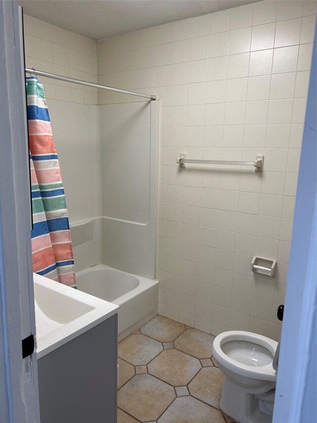 68 Ramapo Rd, Garnerville, NY 10923 - full bathroom featuring shower / bathtub combination with curtain, vanity, tile patterned floors, and tile walls