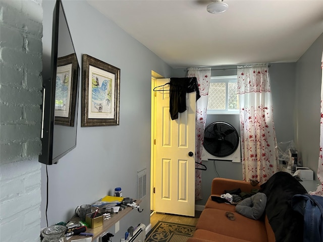 68 Ramapo Rd, Garnerville, NY 10923 - laundry room with wood finished floors