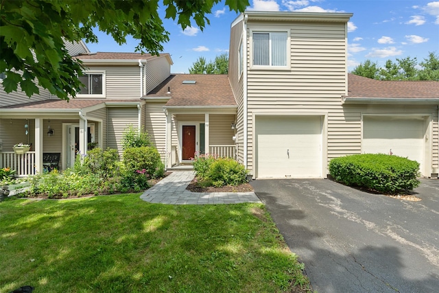 79 Meadow Way, Hopewell Junction, NY 12533 - traditional-style home featuring driveway, a front lawn, a porch, and roof with shingles