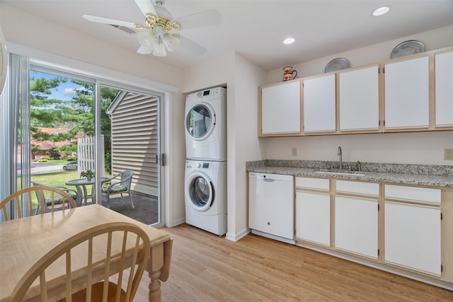 79 Meadow Way, Hopewell Junction, NY 12533 - kitchen featuring dishwasher, stacked washing machine and dryer, light wood-style floors, recessed lighting, and a ceiling fan