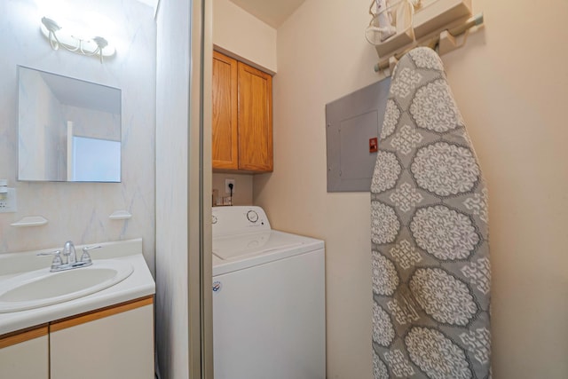 77 Fairview Cir Unit 77, Middle Island, NY 11953 - laundry area with washer / dryer, electric panel, and cabinet space