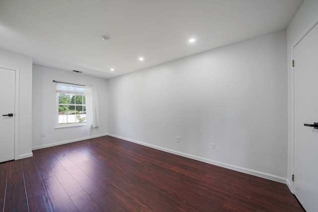 77 Fairview Cir Unit 77, Middle Island, NY 11953 - empty room with dark wood-style flooring and recessed lighting