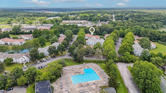 276 Fairview Cir, Middle Island, NY 11953 - aerial view of a pool and a heavily wooded area