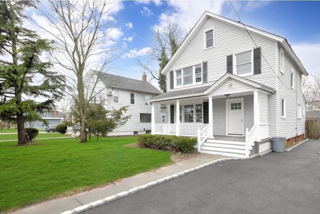 178 N Ocean Ave, Patchogue, NY 11772 - traditional style home featuring covered porch and a front yard