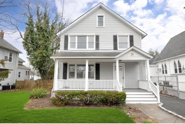 178 N Ocean Ave, Patchogue, NY 11772 - american foursquare style home with covered porch and a front yard