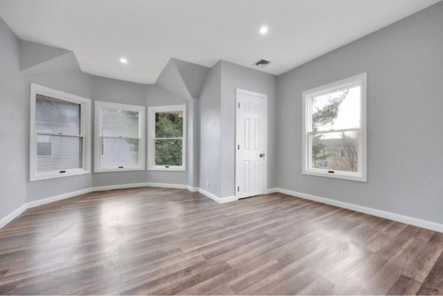 178 N Ocean Ave, Patchogue, NY 11772 - spare room featuring plenty of natural light, dark wood finished floors, and recessed lighting