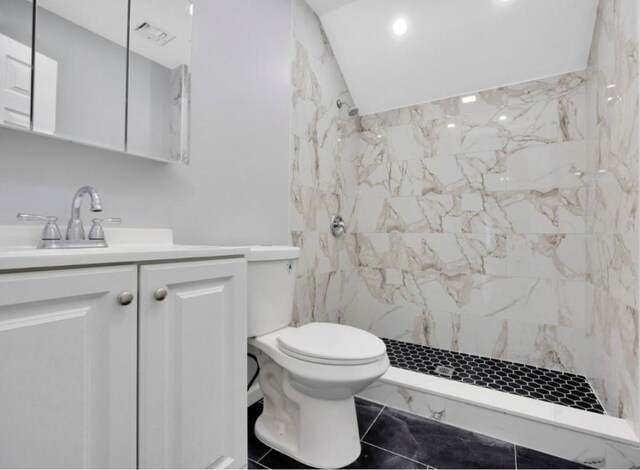 178 N Ocean Ave, Patchogue, NY 11772 - bathroom with a marble finish shower, vanity, and recessed lighting