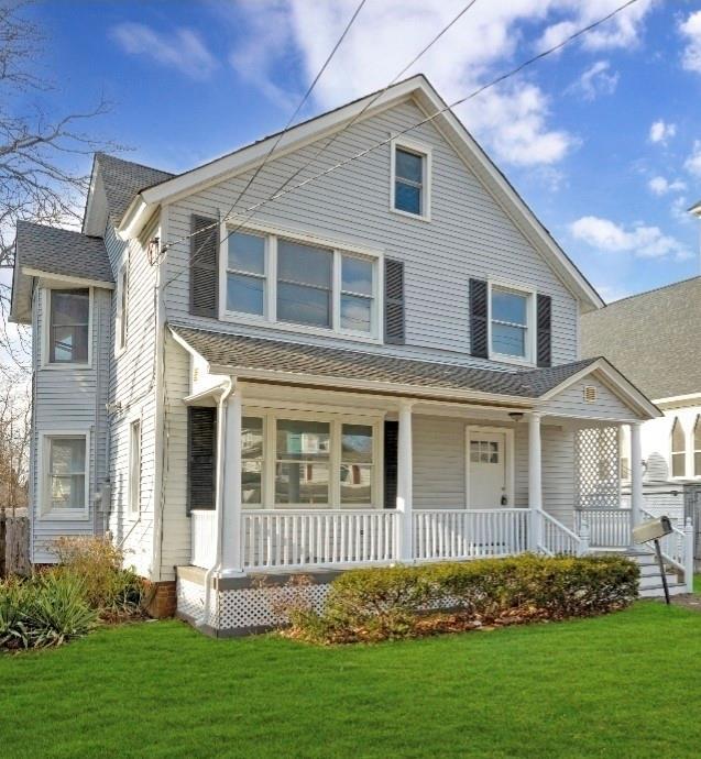 178 N Ocean Ave, Patchogue, NY 11772 - view of front of house featuring covered porch and a front yard