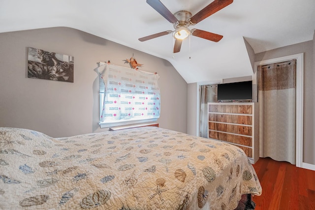 557 Newbridge Rd, East Meadow, NY 11554 - bedroom featuring lofted ceiling, dark wood-type flooring, and ceiling fan