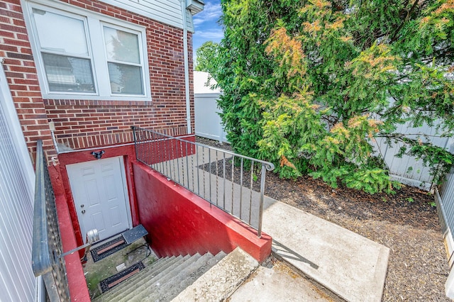 557 Newbridge Rd, East Meadow, NY 11554 - entrance to property with brick siding