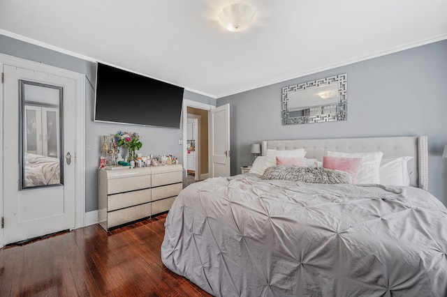 557 Newbridge Rd, East Meadow, NY 11554 - bedroom with wood finished floors and crown molding