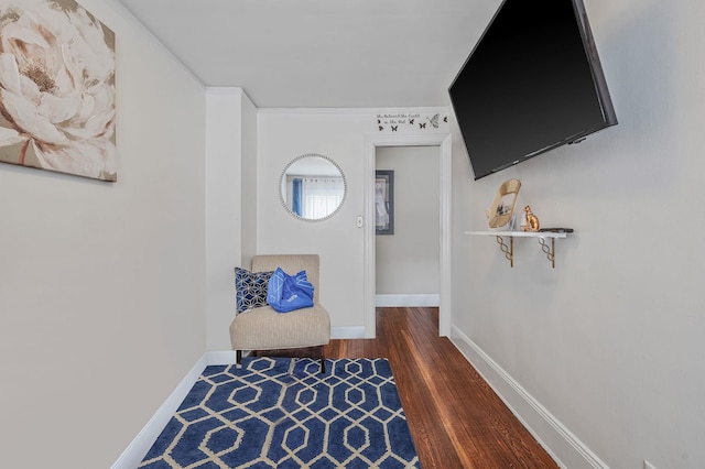 557 Newbridge Rd, East Meadow, NY 11554 - hall featuring wood finished floors and baseboards