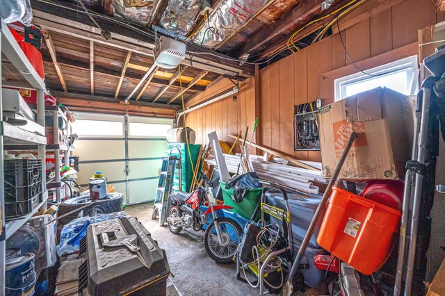 557 Newbridge Rd, East Meadow, NY 11554 - garage featuring a garage door opener